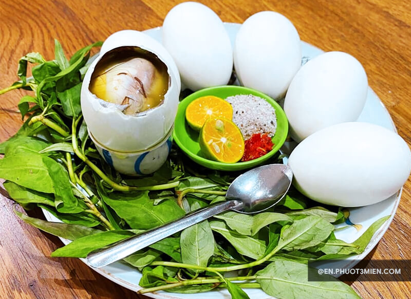 Eating Fetal Duck Egg in Ho Chi Minh City (Balut)